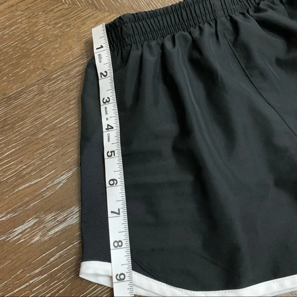 Nike black with white trim athletic shorts Size M
